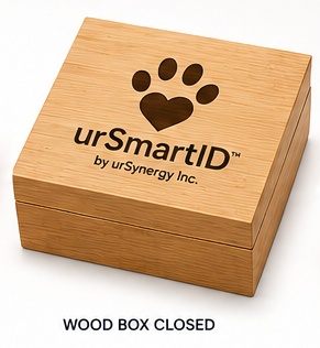 The closed bamboo wood box with the urSmartID paw-heart logo engraved on the lid